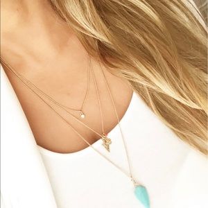 Express gold layered hamsa stone necklace